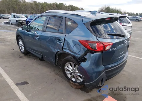 2014 Mazda Cx-5 Grand Touring z USA, uszkodzony, nr VIN JM3KE2DY6E0415702